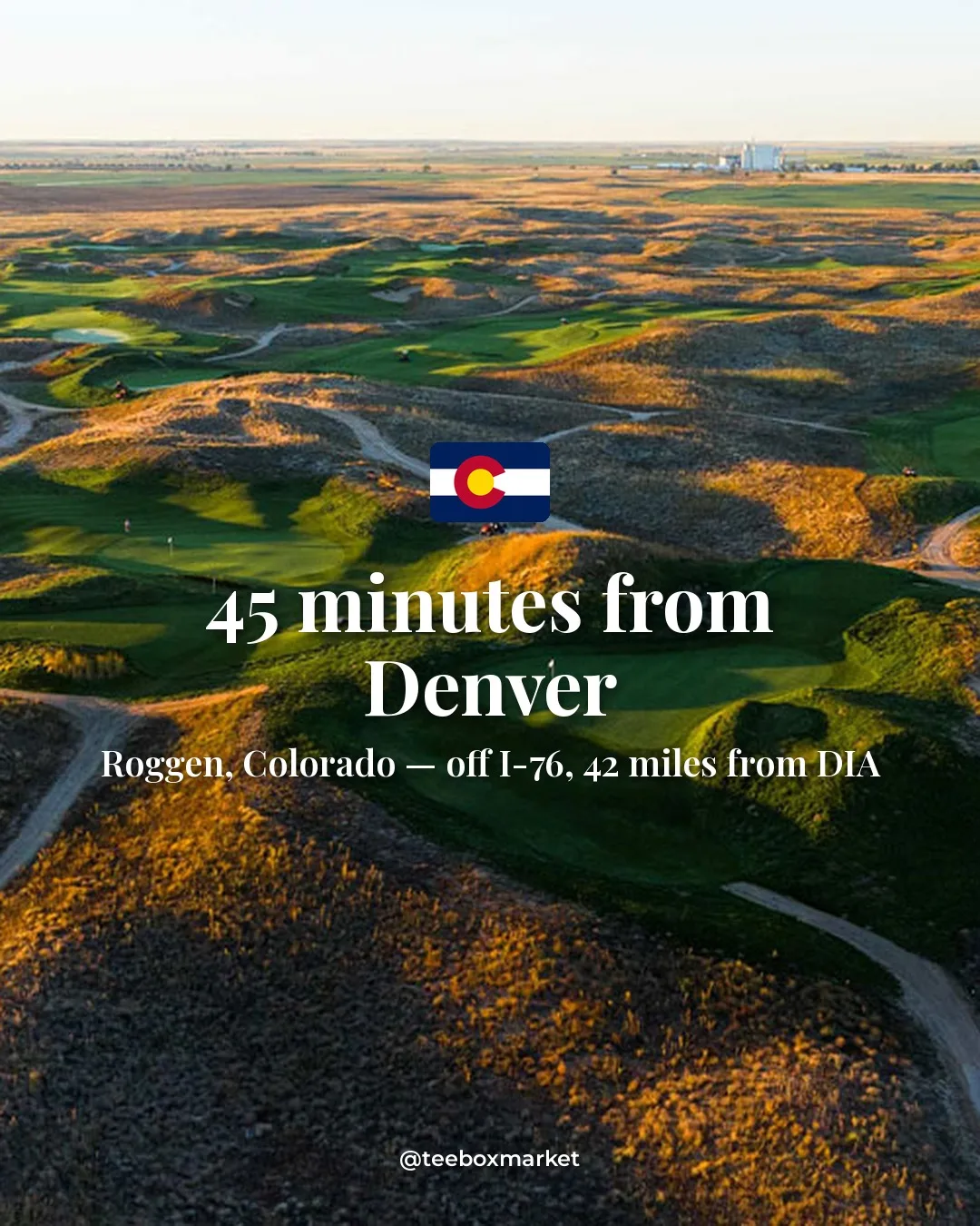 Aerial of the rolling dunes and fairways of Rodeo Dunes with a Colorado flag — 45 minutes from Denver, off I-76